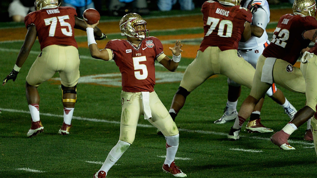 Jameis Winston drops back to pass against Auburn at the Rose Bowl.