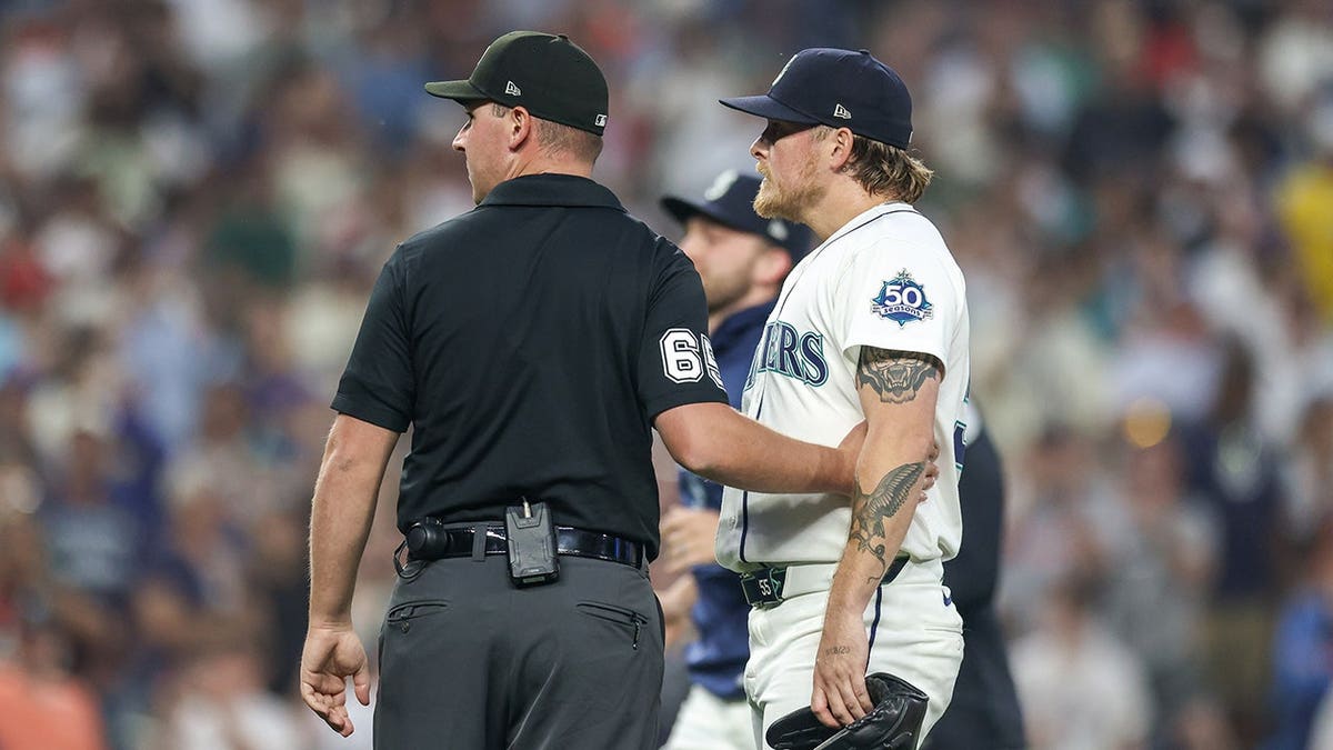 Gabe Speier is held backmost  connected  the tract  during a Mariners-Tigers crippled  astatine  T-Mobile Park.