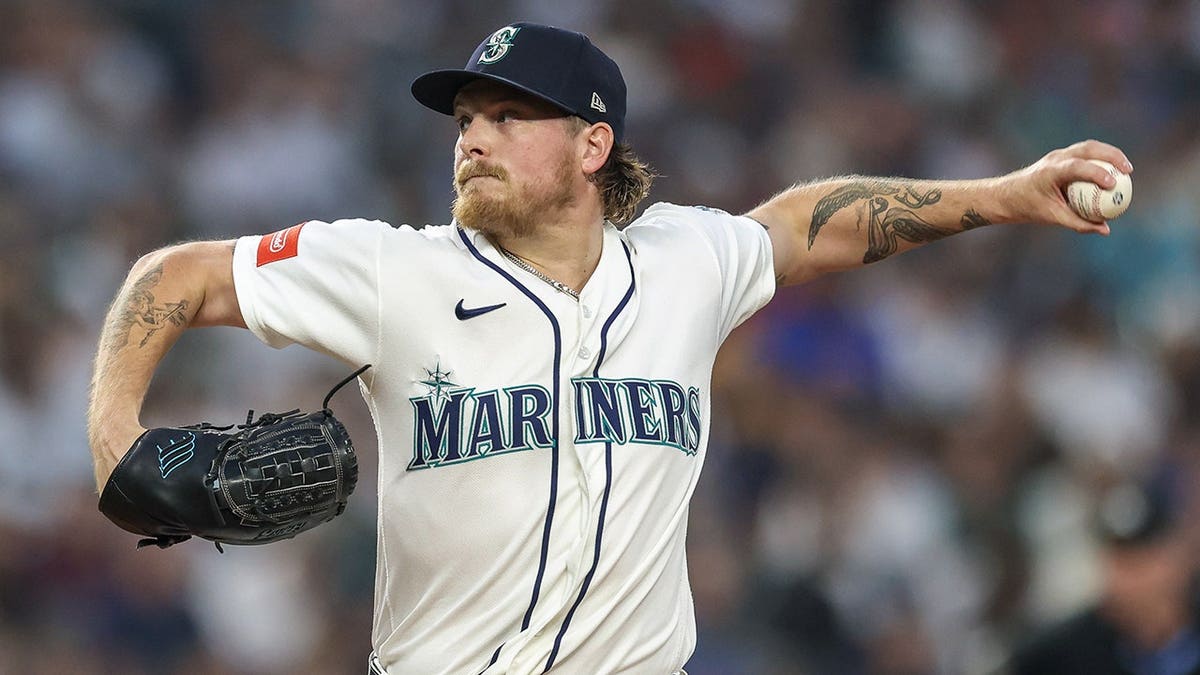 Gabe Speier pitches during the eighth inning against Detroit Tigers.
