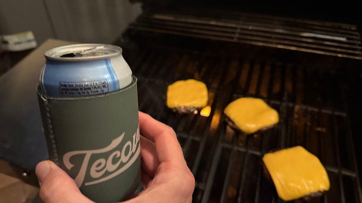 Screencaps reader Gen X Warren M checks in with cheeseburgers on the grill.