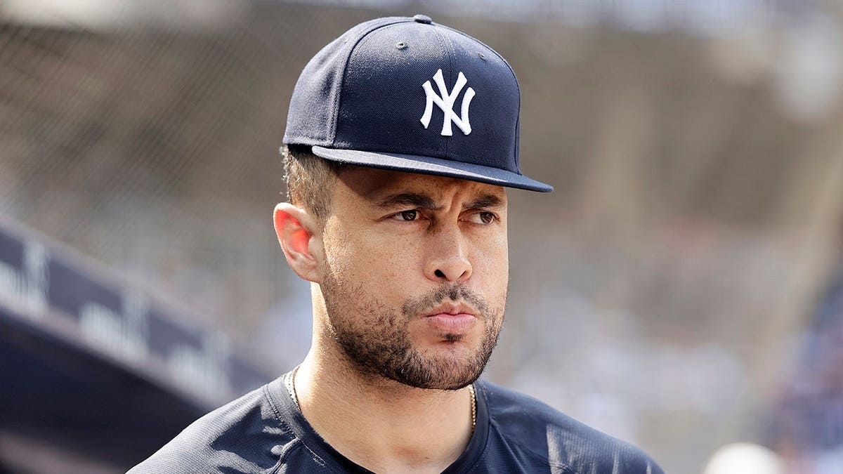 Giancarlo Stanton of the New York Yankees looks on during a game against the Seattle Mariners.