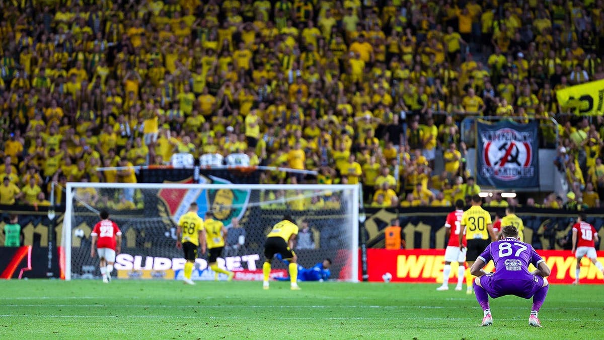 Gabriel Kobylak saves a penalty kick during a UEFA Conference League match between GKS Katowice and Hapoel Tel Aviv.