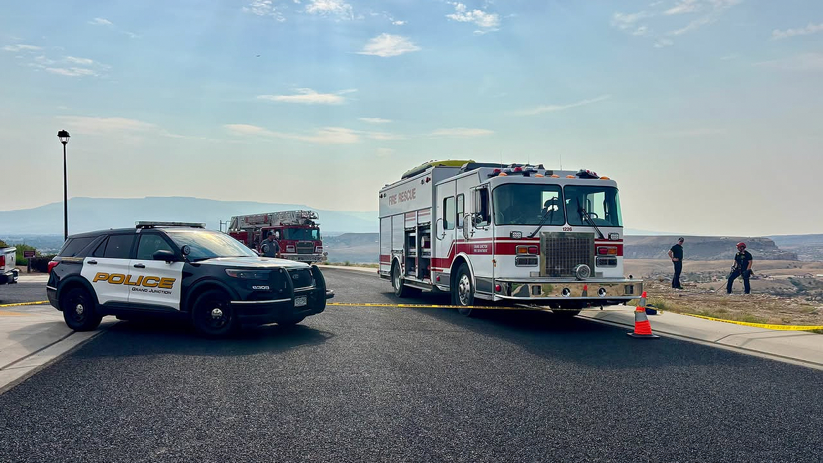 Grand Junction police and fire vehicles at the scene of a crash near Lookout Lane that killed five teenage boys in Colorado