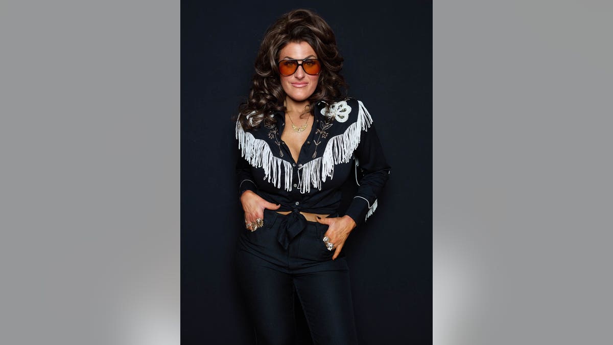 Hannah Dasher wearing fringe jacktet