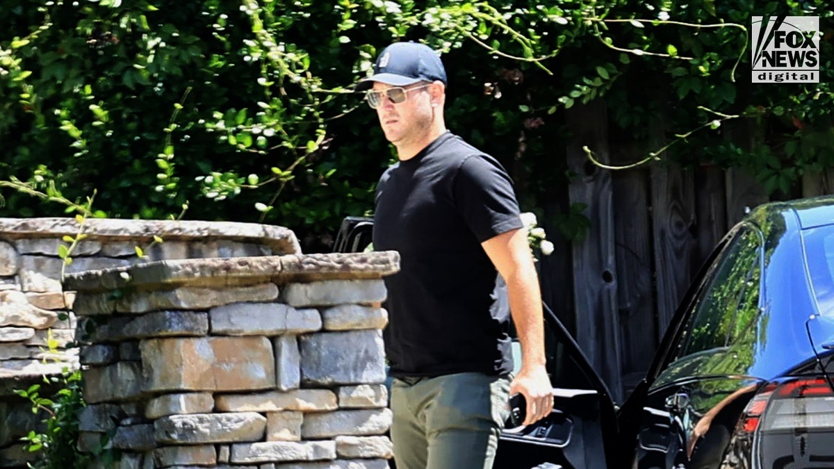 Zach Hickerson walks down the strett