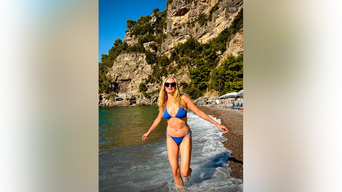 Heather Graham in a blue bikini.