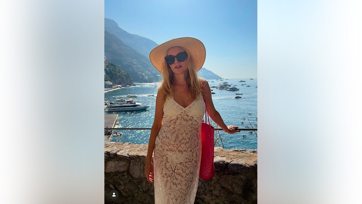 Heather Graham in white coverup