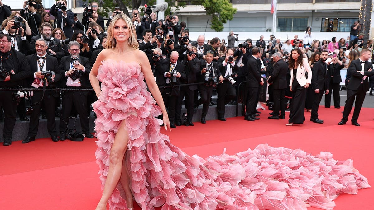 Heidi Klum in a pink dress on the red carpet at the Cannes Film Festival.