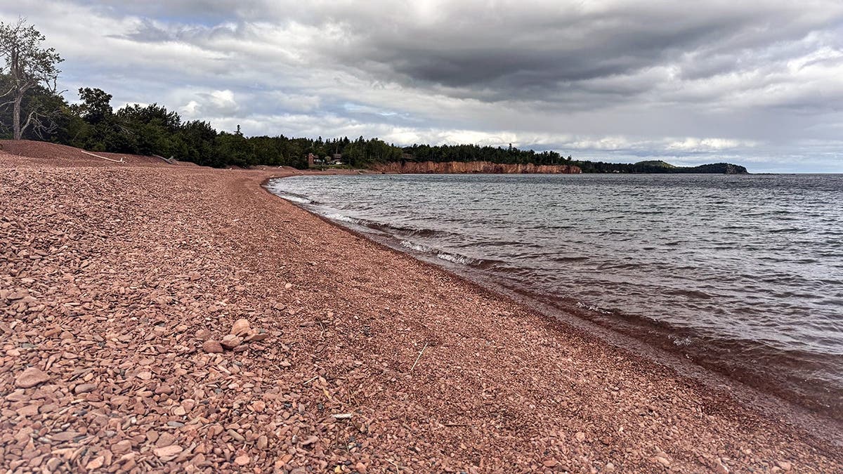 view of pink rocks along Lake Superior shore at Iona's Beach