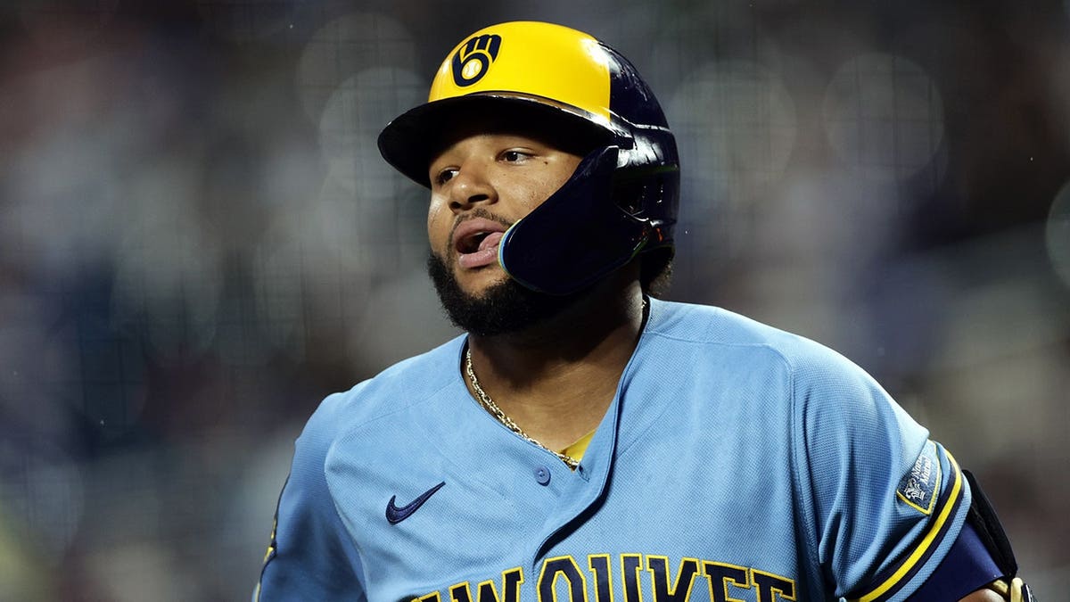Jackson Chourio reacts after hitting a two-run home run during a baseball game.