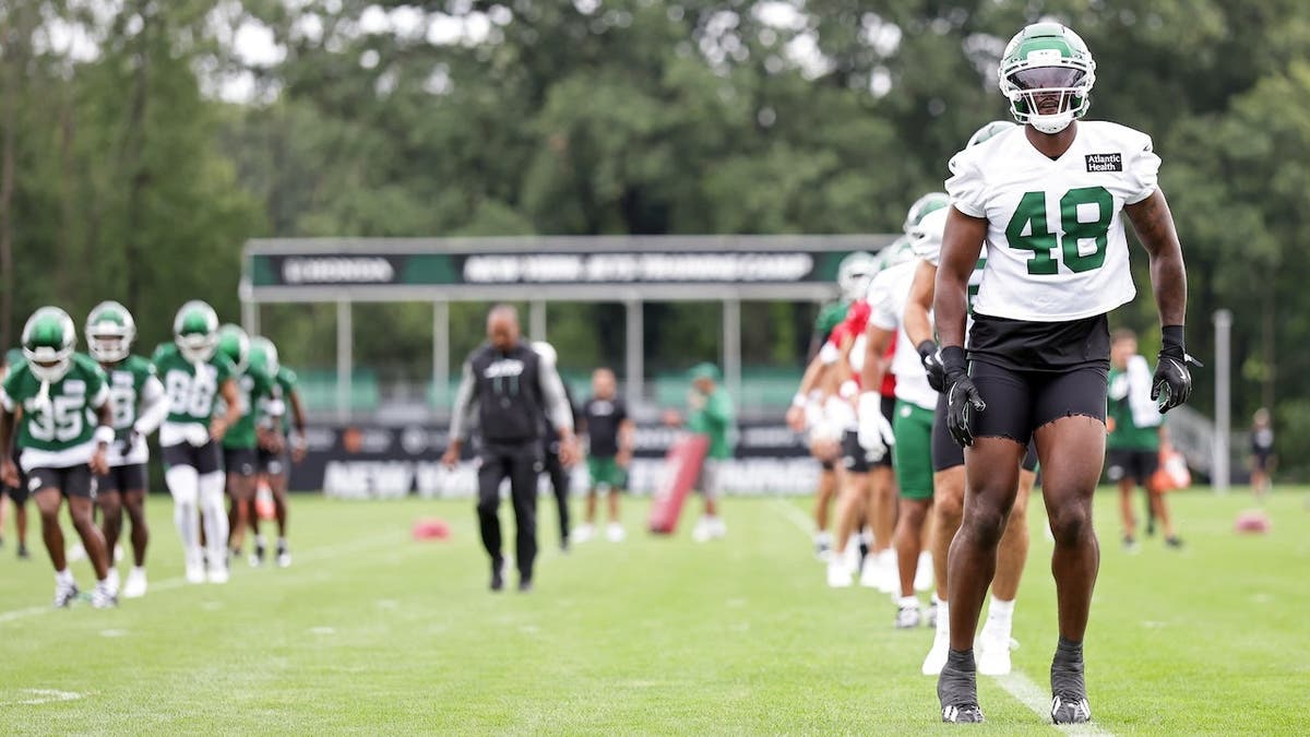 Jaden Keller warms up during New York Jets training camp at Atlantic Health Jets Training Center.