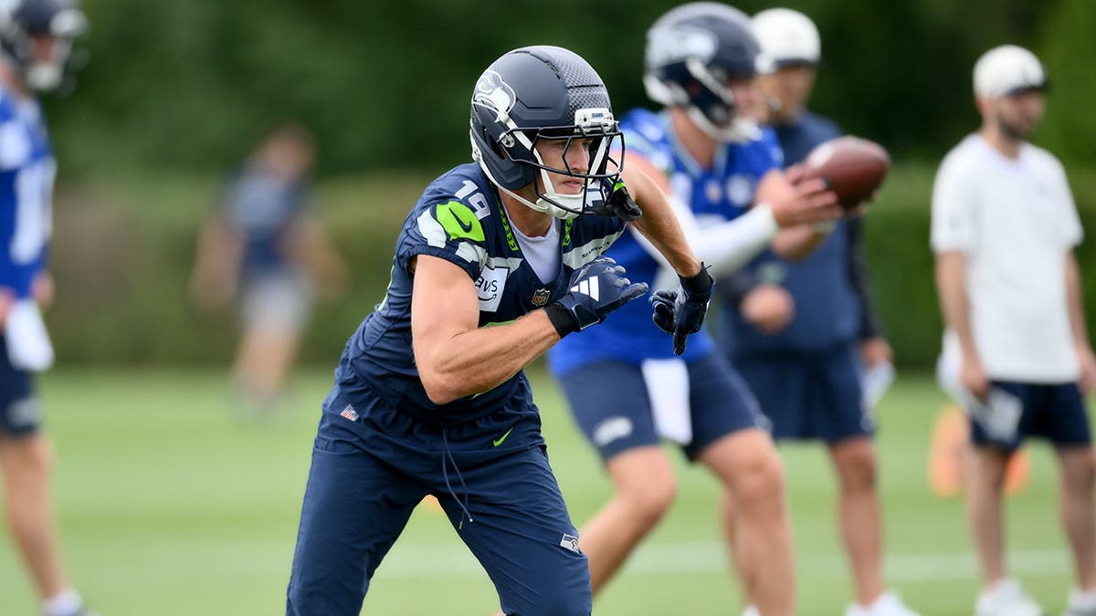 Jake Bobo runs a route during Seahawks training camp.
