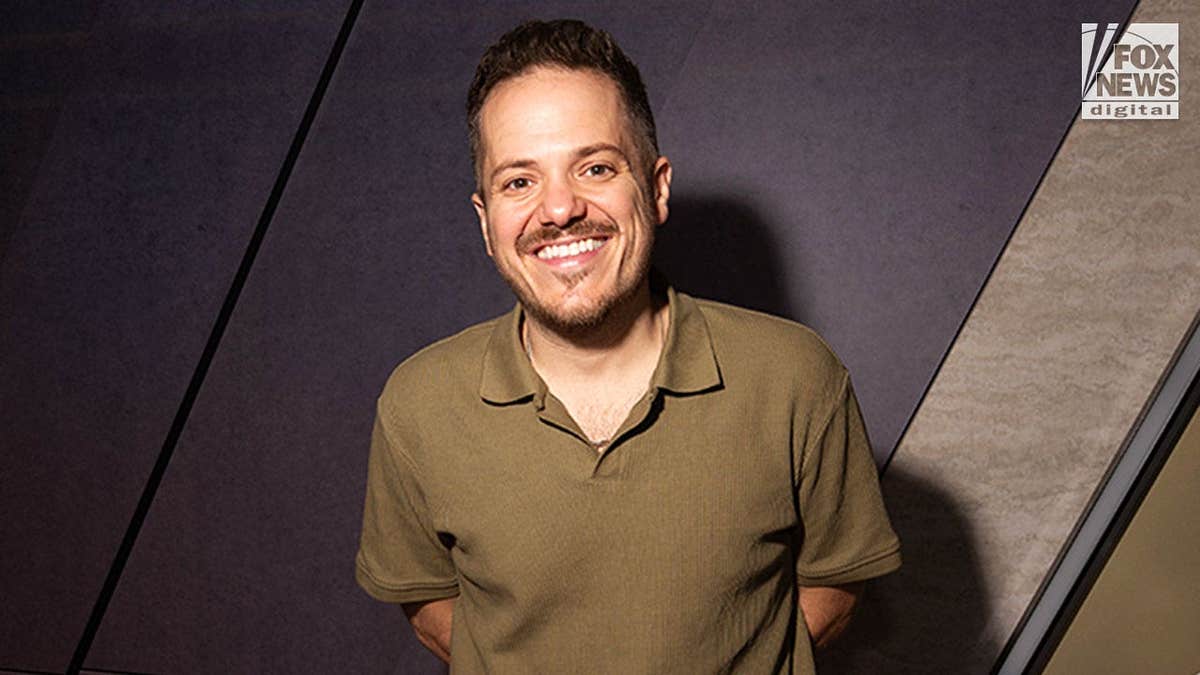 Comedian Jeff Arcuri speaks during an interview in New York.