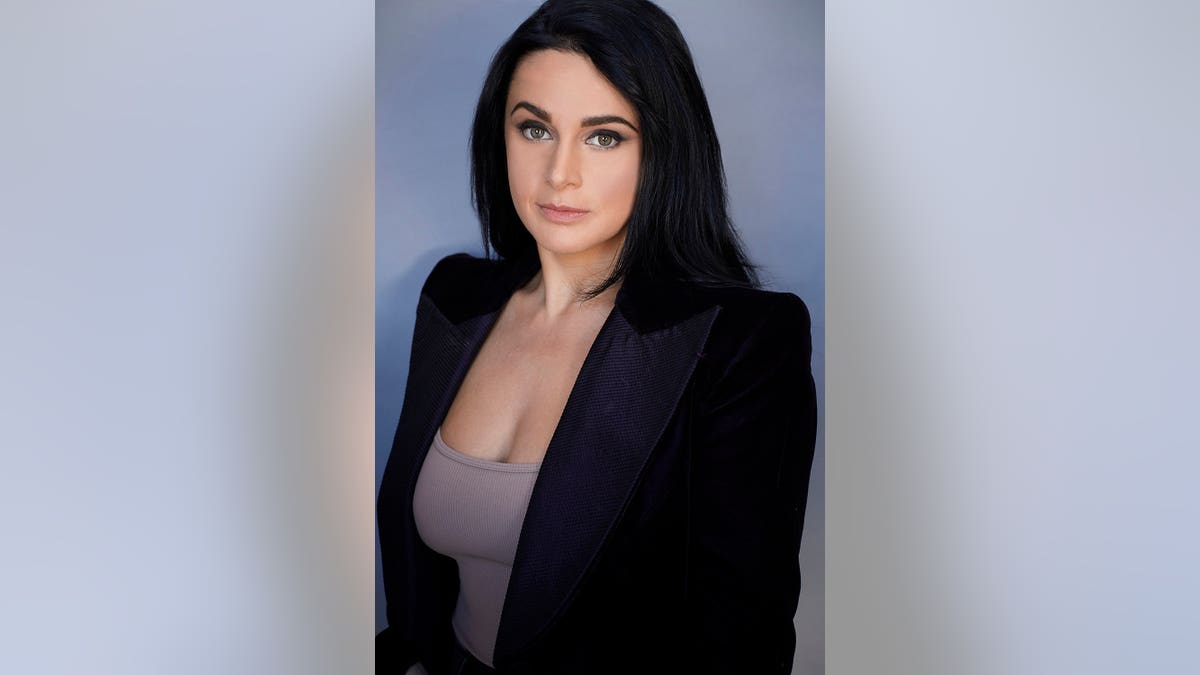 Jennifer Tedmori, podcast host, poses for a portrait.