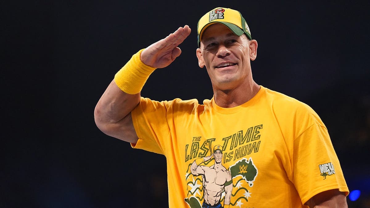 John Cena makes his entrance at RAC Arena during Crown Jewel.