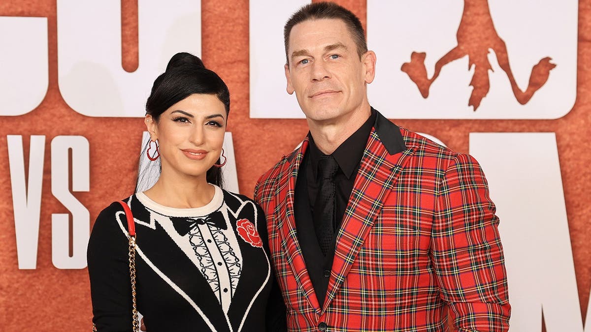 John Cena and Shay Shariatzadeh attend the Los Angeles premiere of Coyote Vs. ACME.