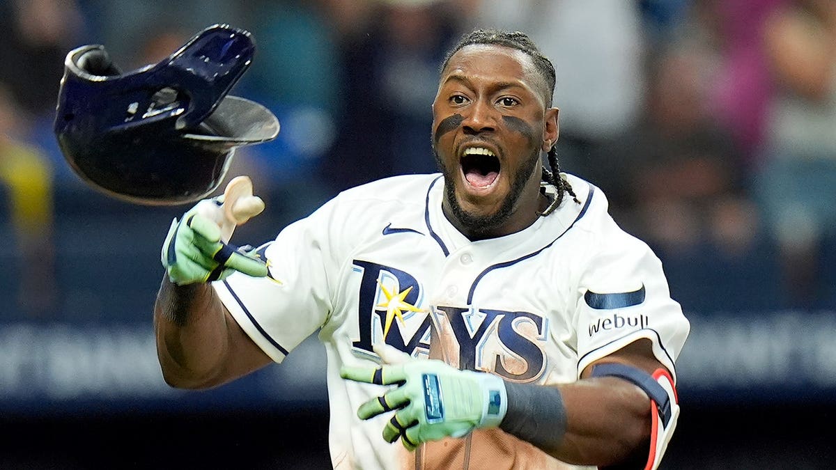 Jorge Mateo celebrates his walk-off hit during a baseball game.