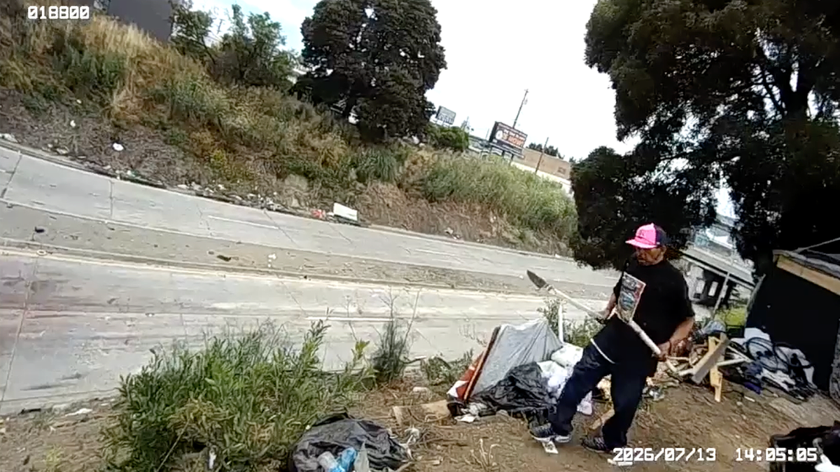 Jose Angel Castillo holds a long bladed weapon during a confrontation with Oakland police