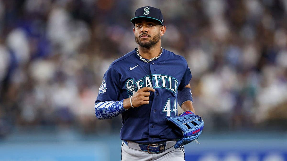 Julio Rodríguez #44 of the Seattle Mariners runs off the field