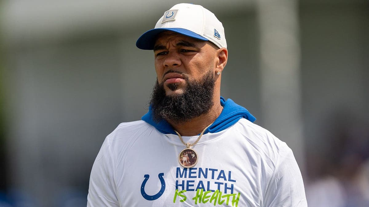 Keenan Allen watches during a joint practice between the Colts and Falcons.
