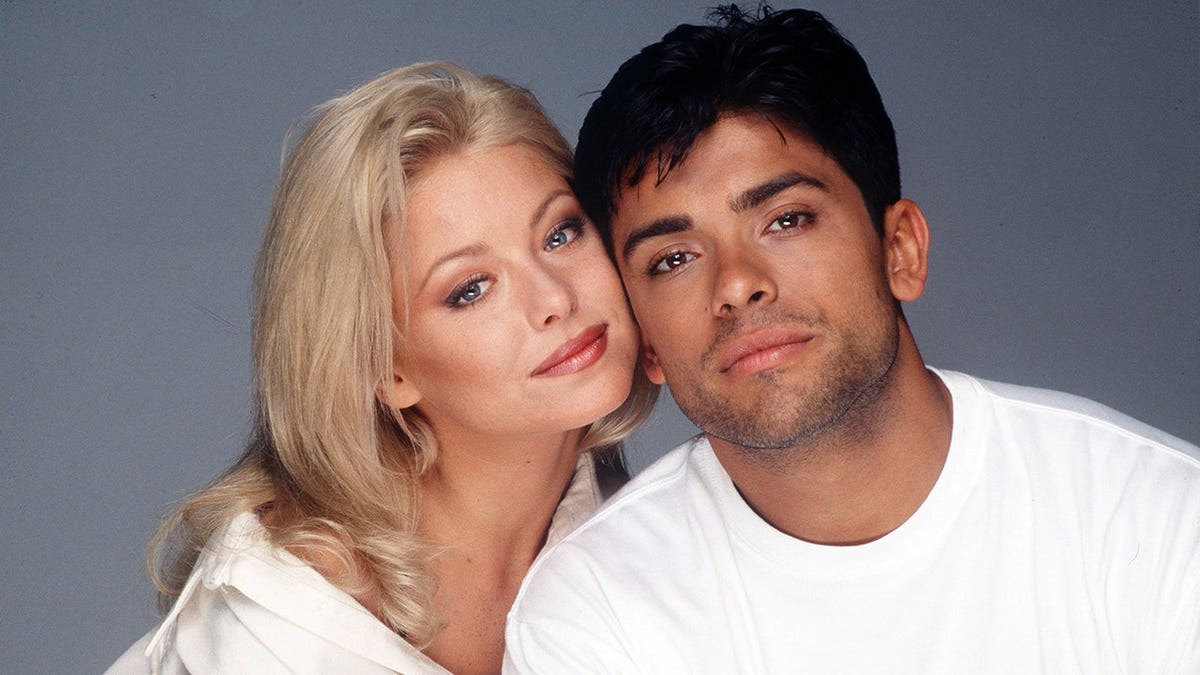 Kelly Ripa and Mark Consuelos in costume on the set of All My Children.