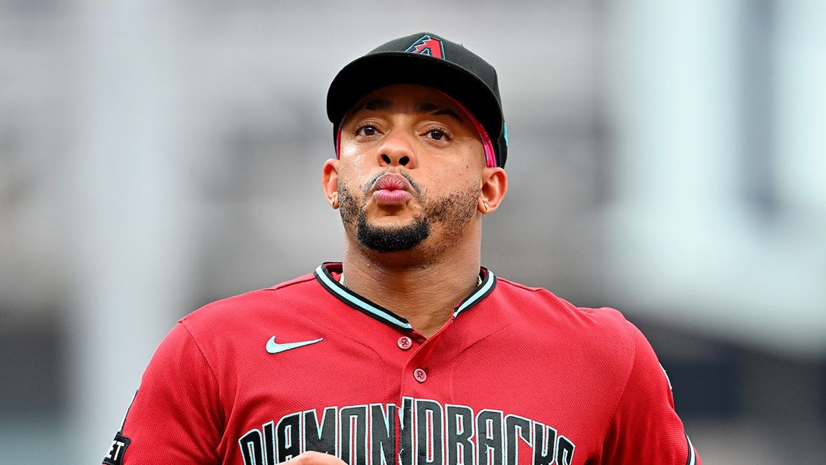 Ketel Marte runs off the field during a baseball game at Progressive Field.