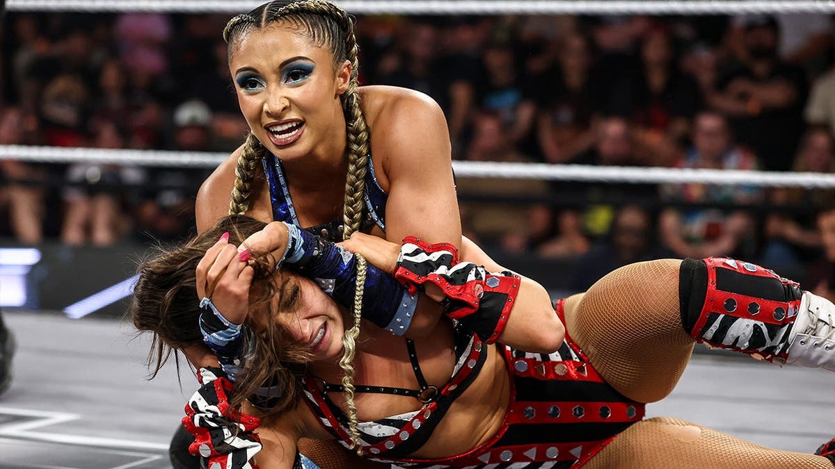Kiana James wrestles Kendal Grey during NXT at the WWE Performance Center.