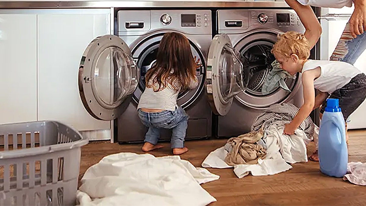 kids and mom in laundry room