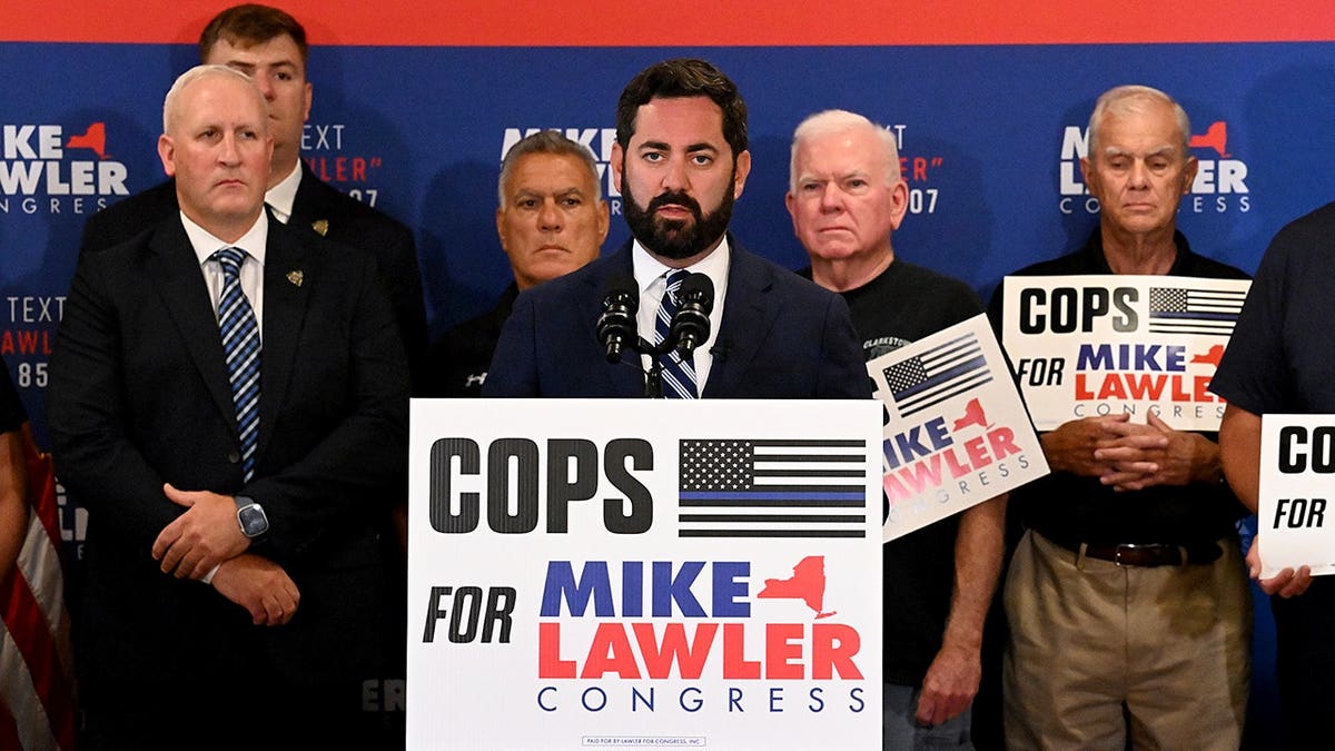 Mike Lawler speaking at a campaign endorsement event with local law enforcement