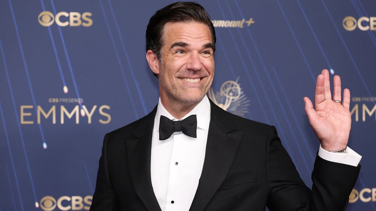 Rob Delaney poses on the red carpet at the Peacock Theater.