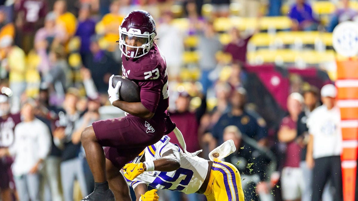 LSU Tigers and Texas A&M Aggies players compete at Tiger Stadium in Baton Rouge.