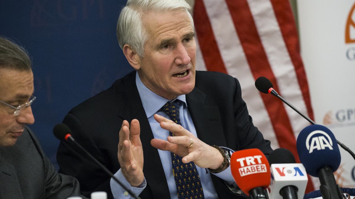Mark Kimmitt speaks during a panel discussion in Washington.