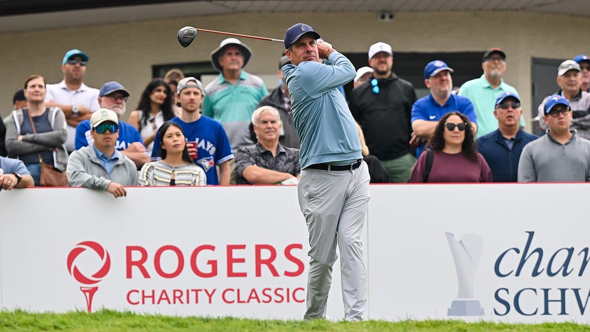 Matt Gogel of the United States hits a tee shot from the first hole during a golf tournament.