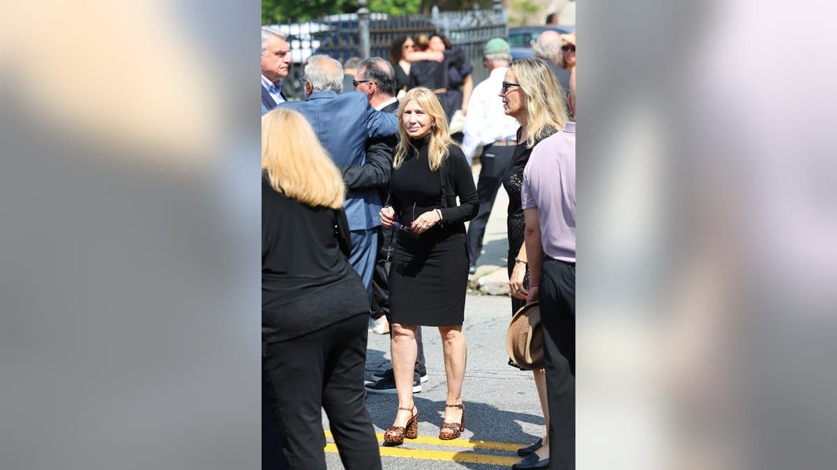 Maureen Van Zandt stands at Vincent Pastore's funeral on Aug. 6.