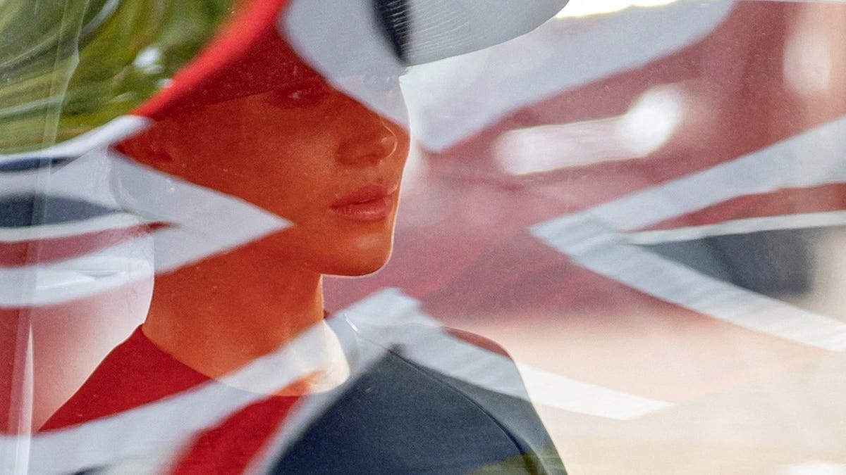 Meghan, Duchess of Sussex sits in a car during Queen Elizabeth's state funeral in London.