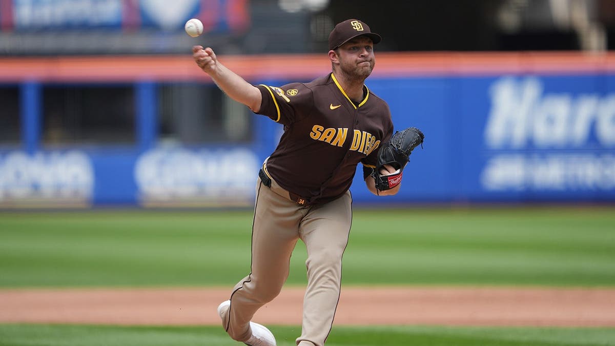 Michael King, pitcher for the San Diego Padres, delivers a pitch.