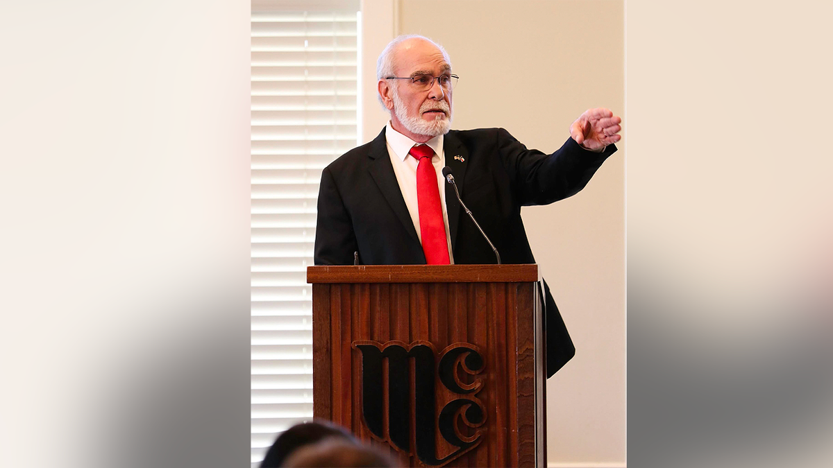 Midland County Judge Terry Johnson speaks from a podium during an event in Midland, Texas