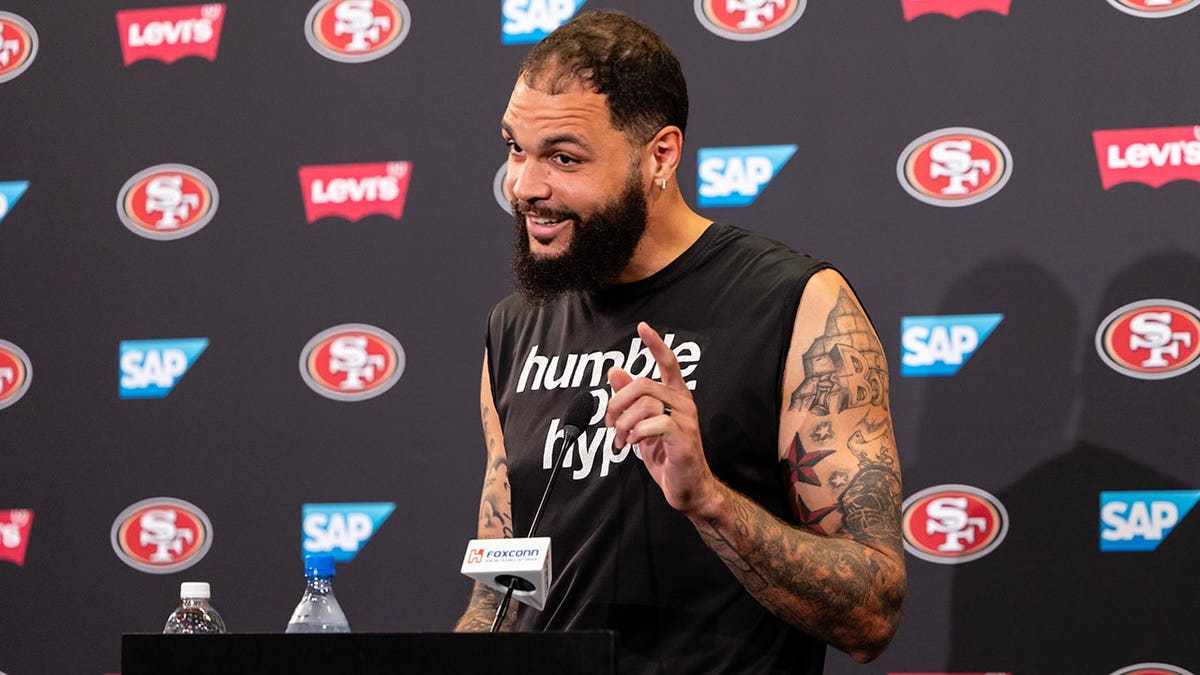 Mike Evans speaks with the media after practice in Santa Clara, Calif.