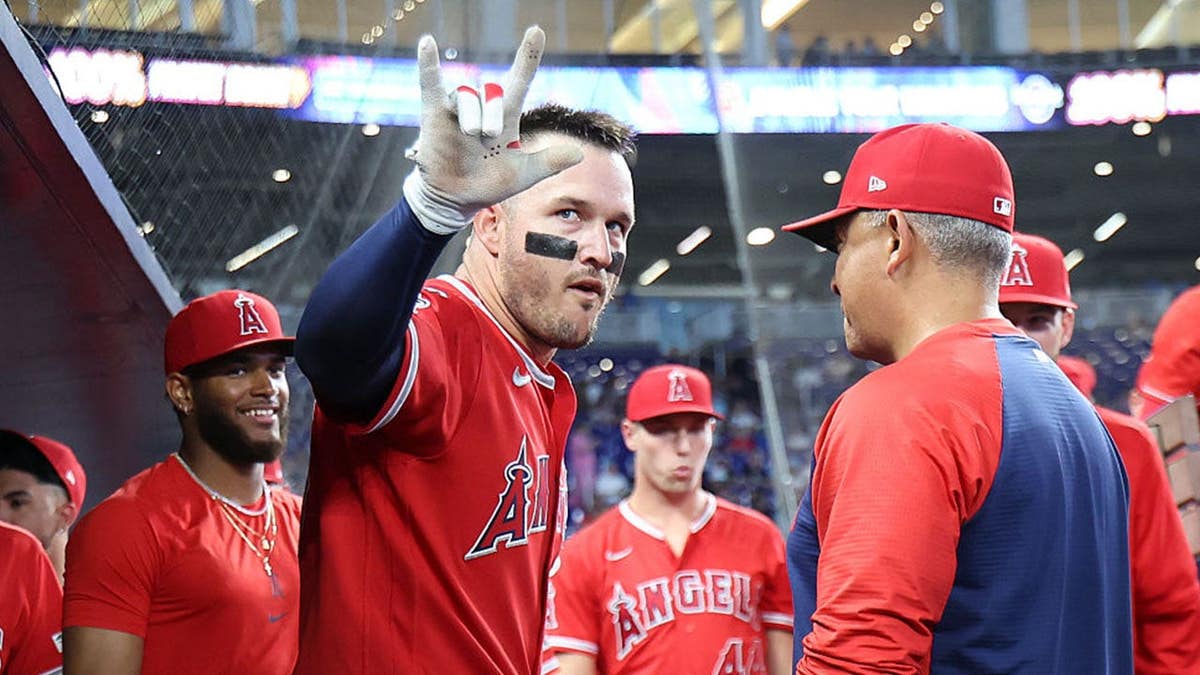 mike trout in the angels dugout