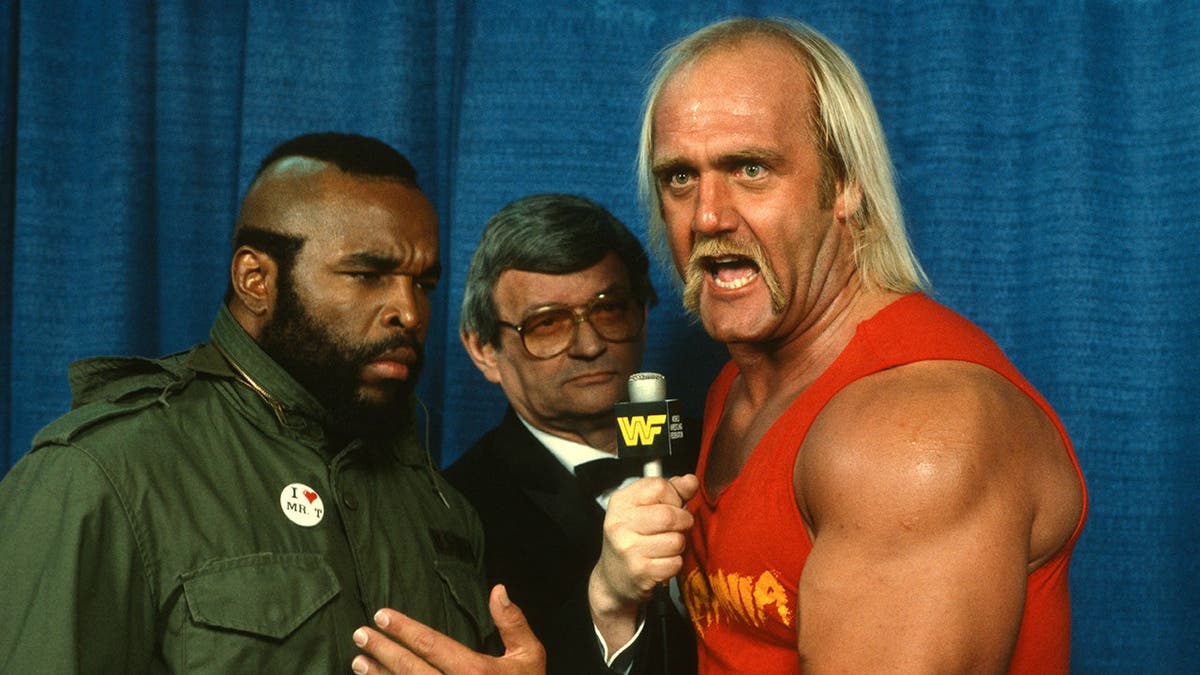 Mr. T and Hulk Hogan stand together at a press event during WrestleMania 1.