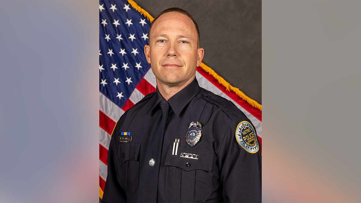 Metro Nashville SWAT Officer Joshua Baney poses in uniform
