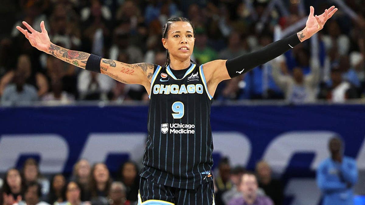 Natasha Cloud celebrates during a Chicago Sky game against the New York Liberty.