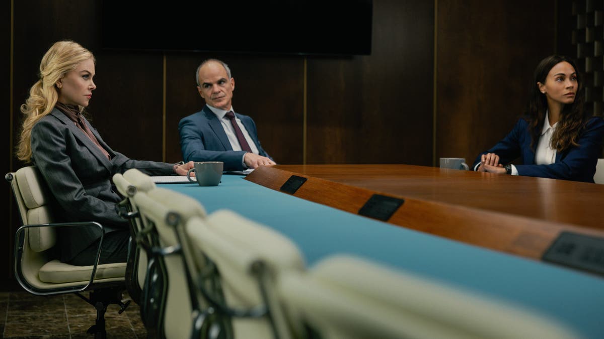 Nicole Kidman, Michael Kelly and Zoe Saldaña stand together in a scene from Lioness season 3.