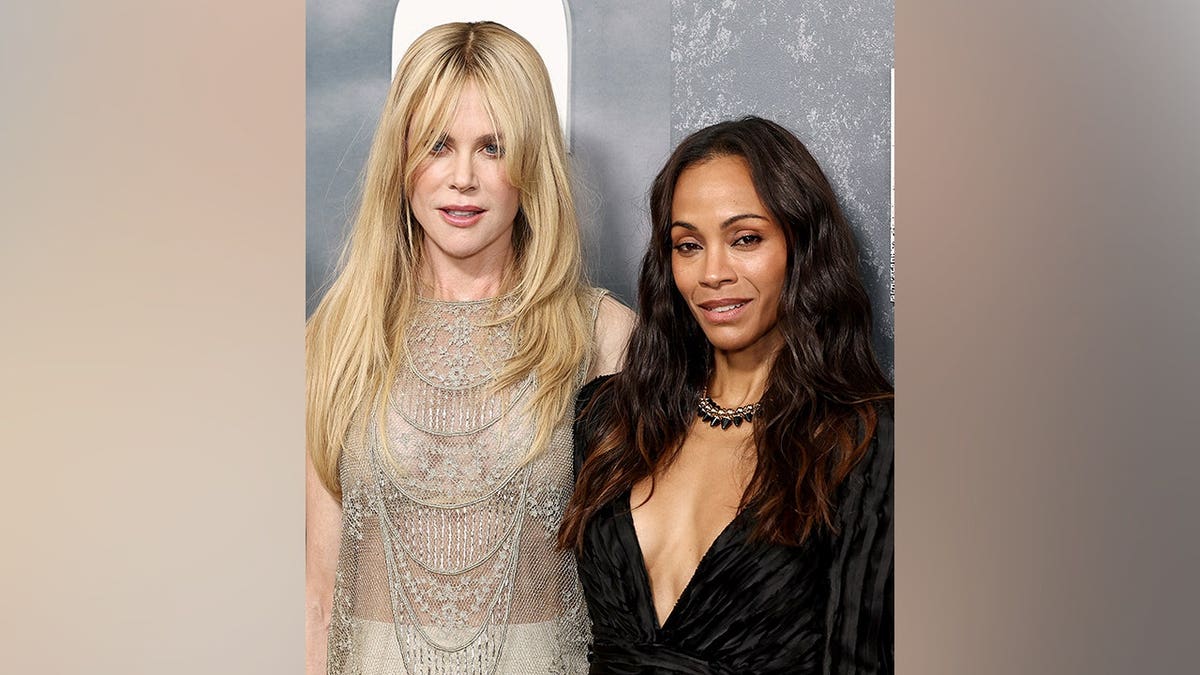 Nicole Kidman and Zoe Saldaña stand together at the Lioness Season 3 premiere.