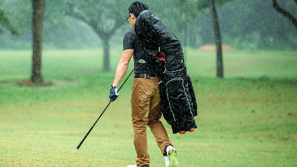 Ohio golfer practices golf in severe weather conditions.