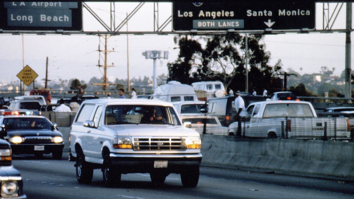O.J. Simpson in a white Ford Bronco during a slow-speed chase on the 405 freeway in Los Angeles.