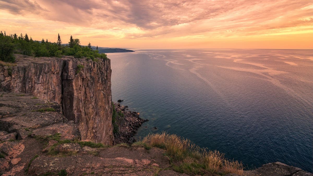 Palisade Head landscape at sunrise with golden light.