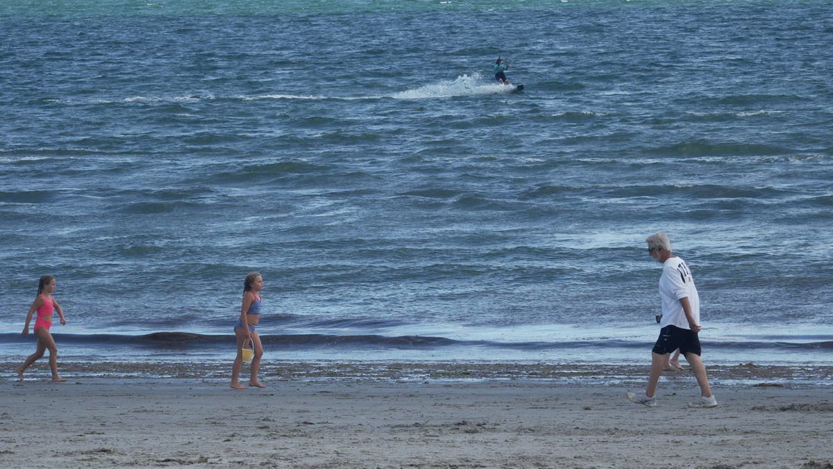 Beachgoers in Scarborough, Maine