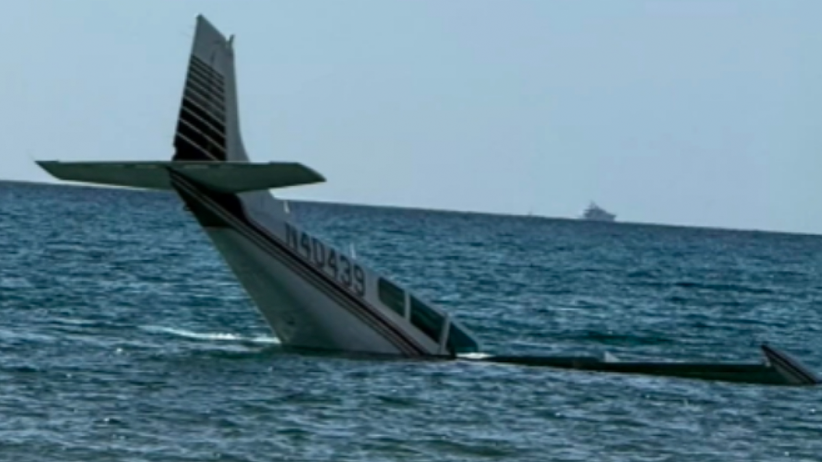 The tail of the plane was seen on video sticking out of the ocean.