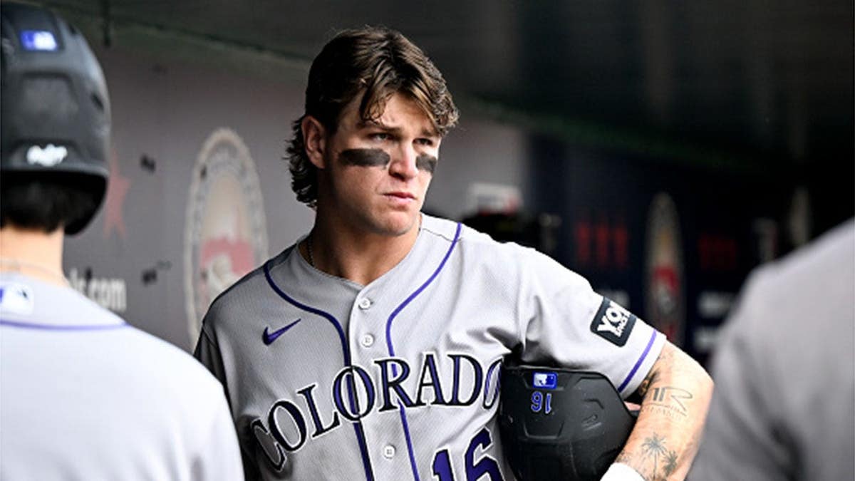 Cole Carrigg looks on during a game at Nationals Park.